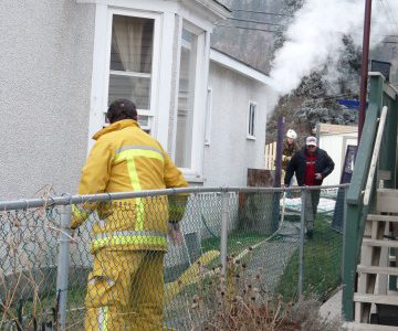 House fire doused while Olympic torch burns