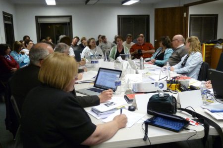 School board meeting deals with school closures and conflicts of interest