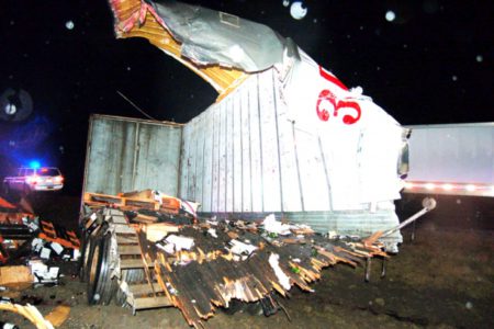 It makes you want to cry! Highway 1 accident spills cargo of pulp and wine all over road