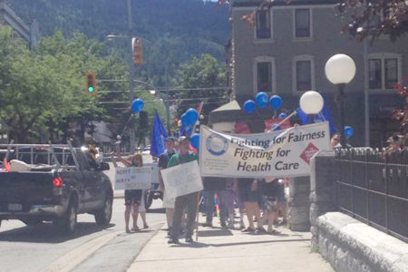 Taking it to the streets: HEU stages rally against privatization of hospital laundry services