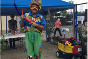 Uncle Chris the Clown keeps kids rolling in laughter at the 106th Fall Fair. 
