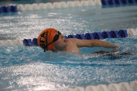 Piranhas win first out of town swim meet