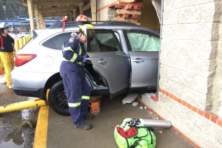 UPDATED: No one injured after car slams through wall of CIBC