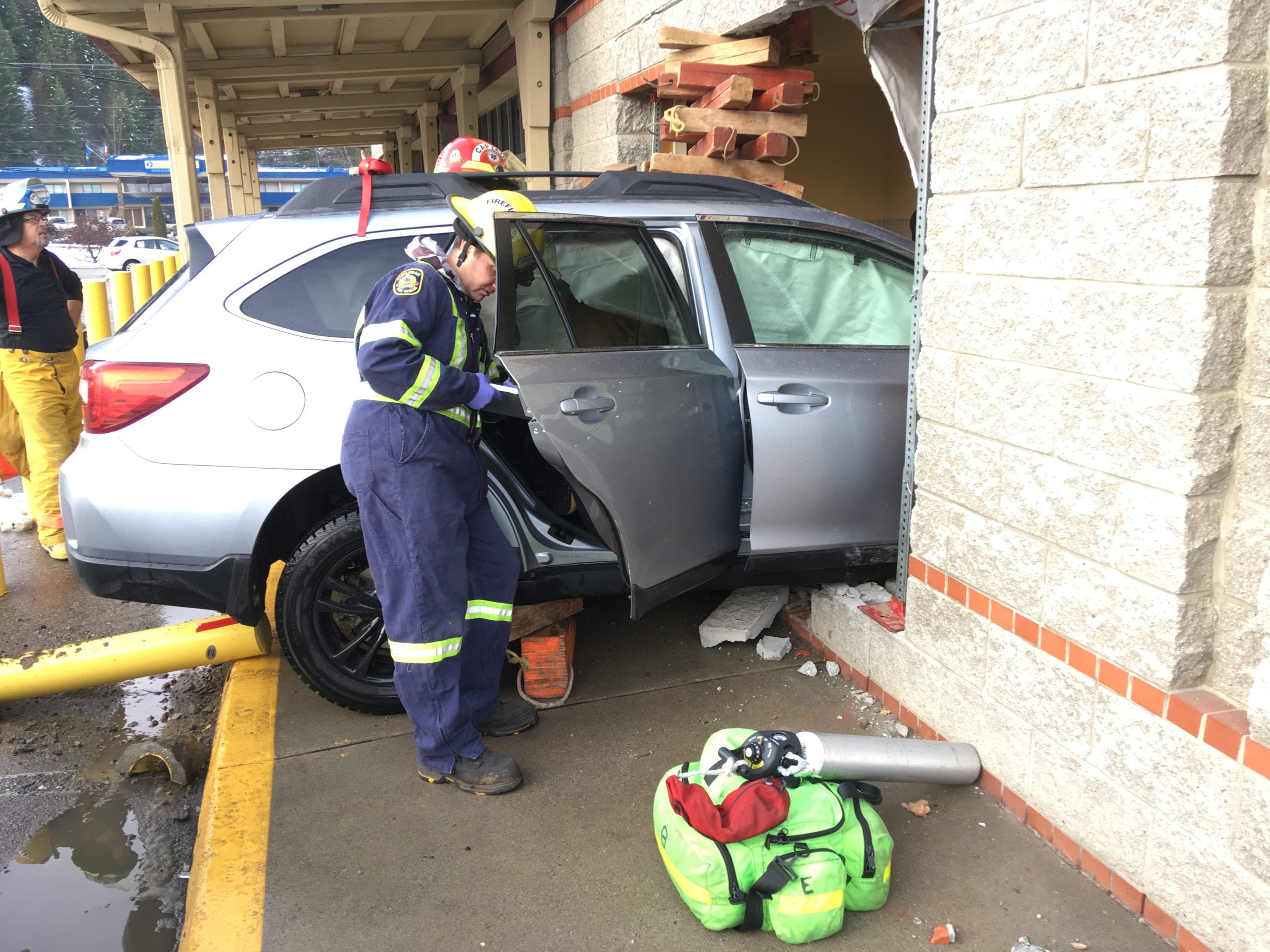 UPDATED: No one injured after car slams through wall of CIBC