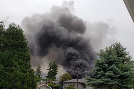 Blaze destroys two homes, prompts investigation into 9-1-1 delays