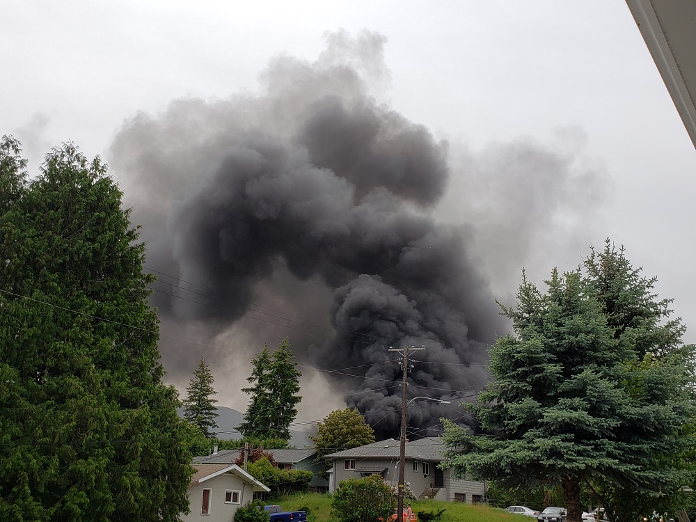 Blaze destroys two homes, prompts investigation into 9-1-1 delays