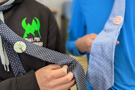 What does wearing a tie have to do with human trafficking?